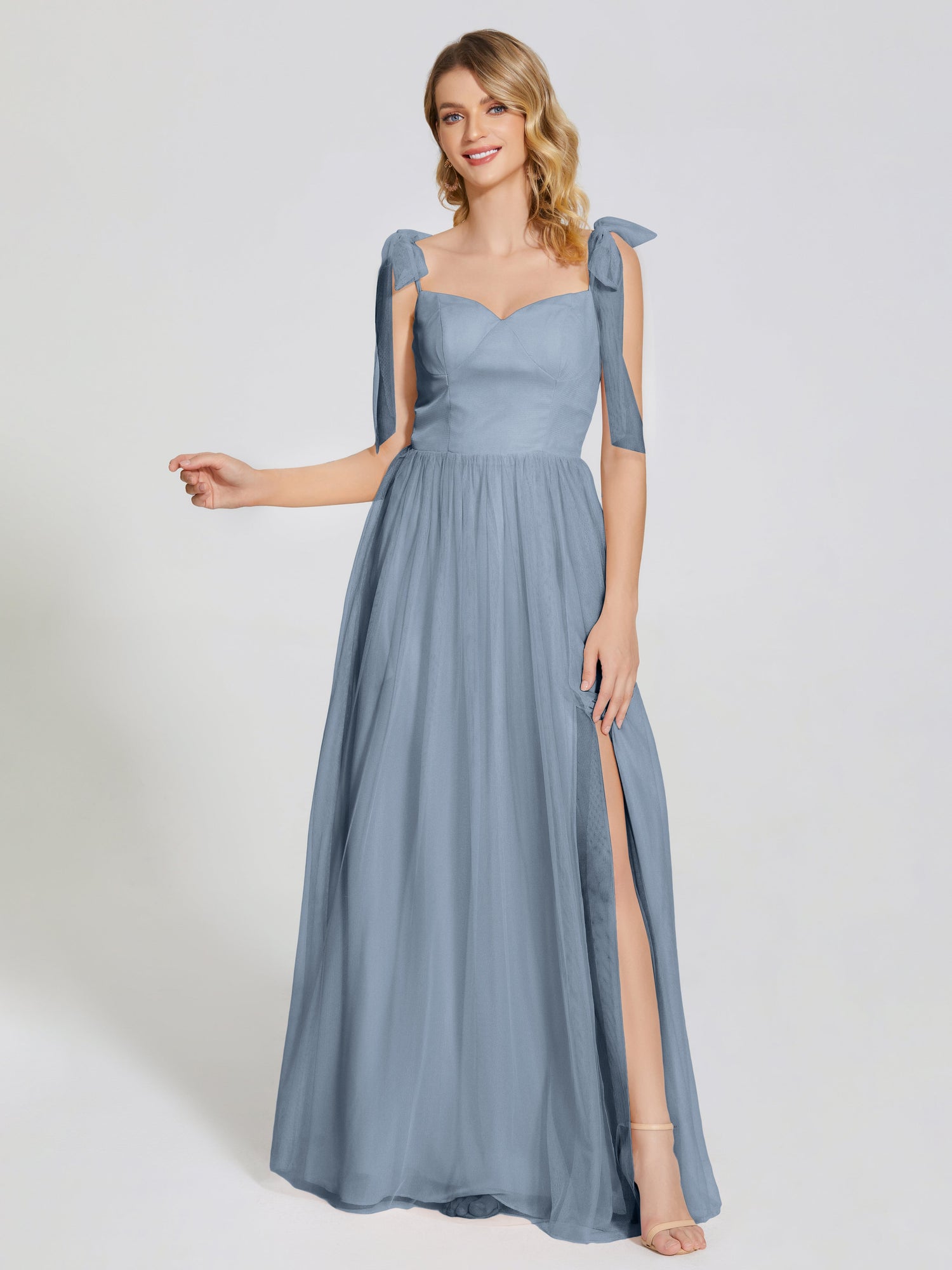 Long satin dress with bow, shoulder strap and slit